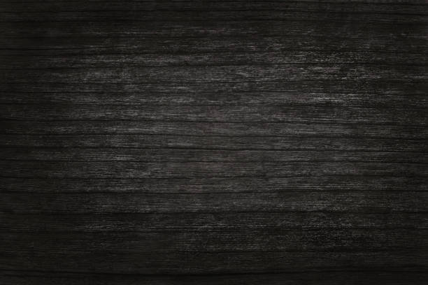 czarne drewniane tło ścienne, tekstura ciemnego drewna z korą z starym naturalnym wzorem do projektowania dzieł sztuki, widok z góry z drewna zbożowego. - wood wood grain dark hardwood floor zdjęcia i obrazy z banku zdjęć