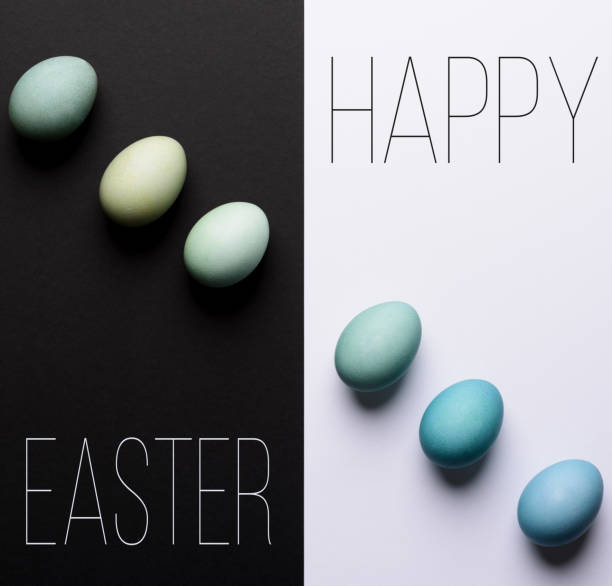Happy Easter black and white background. Hand painted blue Easter eggs abstract minimal concept.