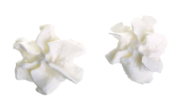 istock whipped cream or meringue isolated on white background. Top view. Flat lay 935262530
