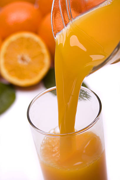 istock Orange juice poured in a glass 93526770