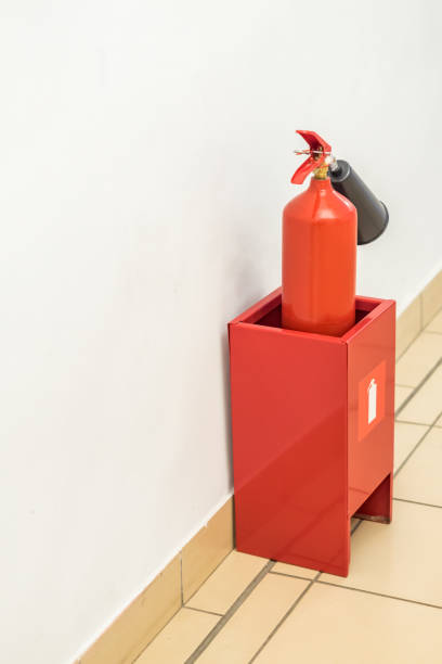 istock fire extinguisher near the wall indoors 935267790