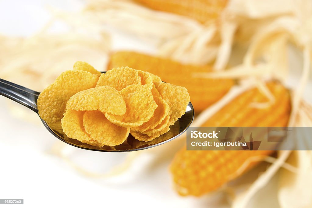 Corn cereal flakes in a spoon  American Culture Stock Photo