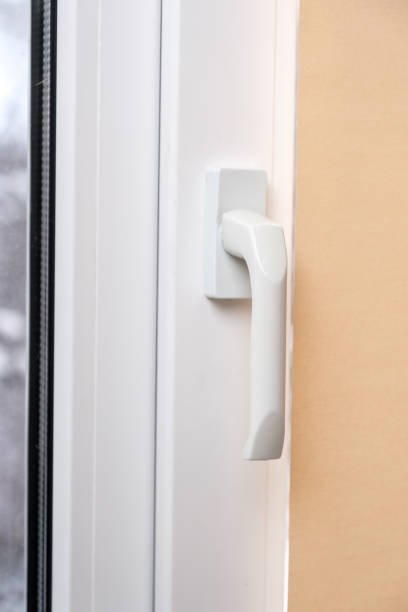 istock Beige blackout roller blind on the window 935274278