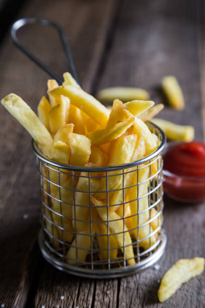 istock French fries with ketchup 935274316
