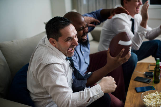 istock Friends cheering sport league together 935277760