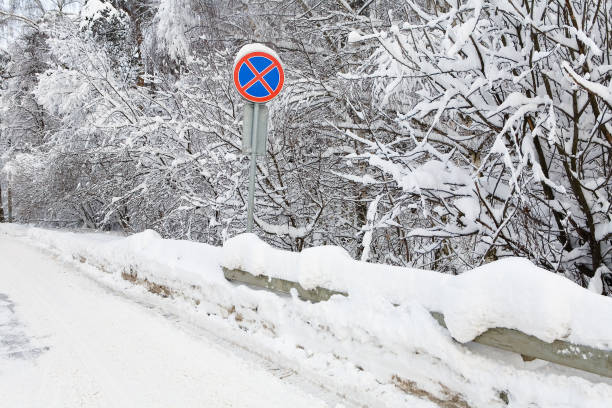 istock The road sign is covered with a layer of snow. 935281034