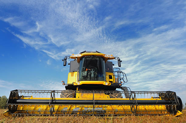 istock combine harvester in the field 93529441