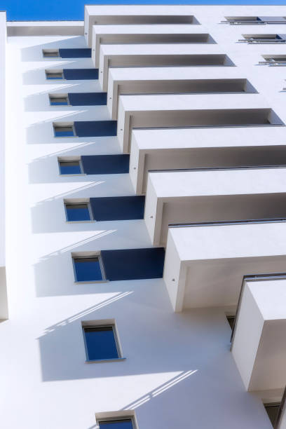 istock Rows of balconies in modern white apartment building 935294526