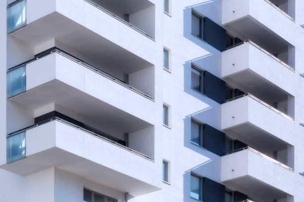 istock Rows of balconies in modern white apartment building 935294676