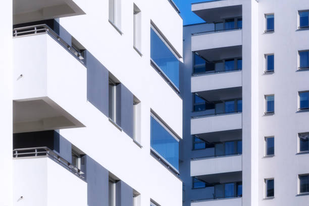 istock Modern architecture of white apartment buildings 935294696
