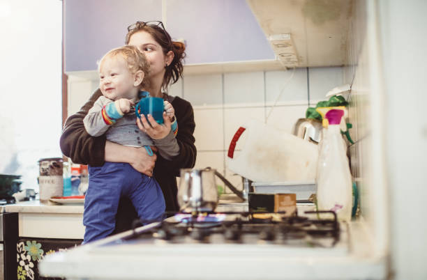 istock Mother With Son In The Kitchen 935305314