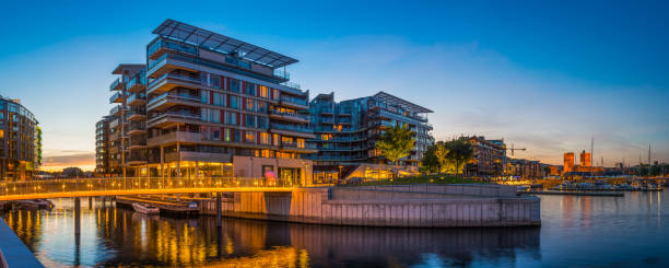 istock Oslo sunset over Aker Brygge harbour waterfront City Hall Norway 935307972