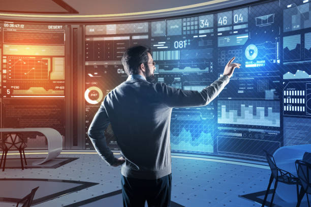 istock Bearded man putting his hand up while pointing to the transparent screen 935311648