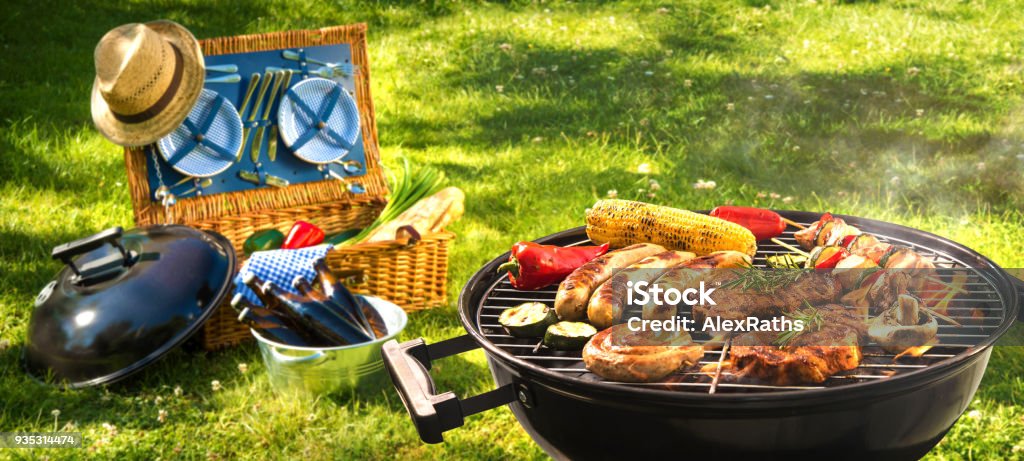 Barbecue picnic Barbecue picnic on a meadow Barbecue Grill Stock Photo