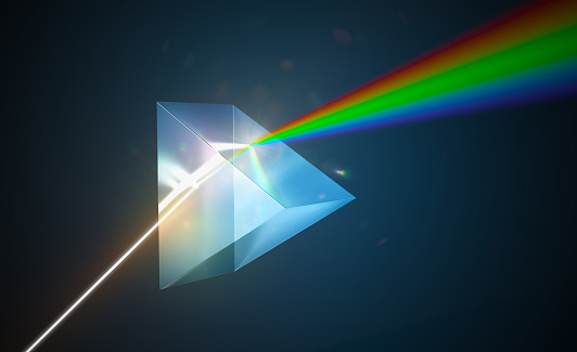 Light dispersion and refraction concept. Light shining through triangular glass prism. 3D rendered illustration.