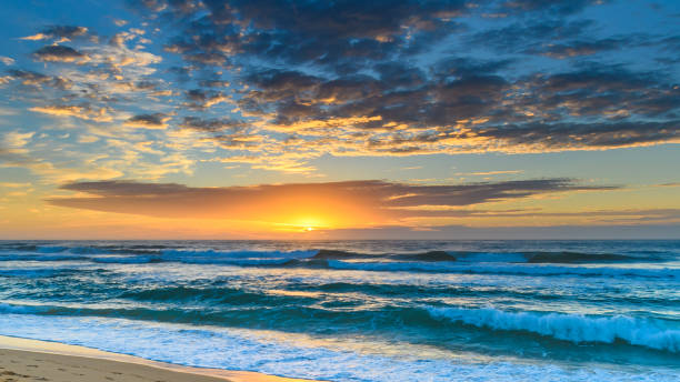 istock Sunrise Seascape from the Beach 935320392