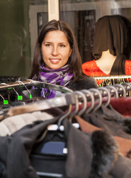istock Young Woman in a Clothing Store 935320870