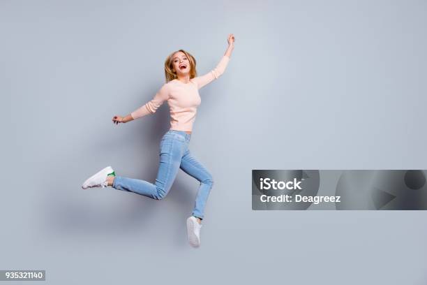 Job Employment Shoes Legs Laughter Person Fan Concept Fulllength Fullsize View Of Laughing Feeling Good Mood Pretty Businesswoman Dressed In Jeans Denim Sweater Outfit Isolated On Gray Background Stock Photo - Download Image Now