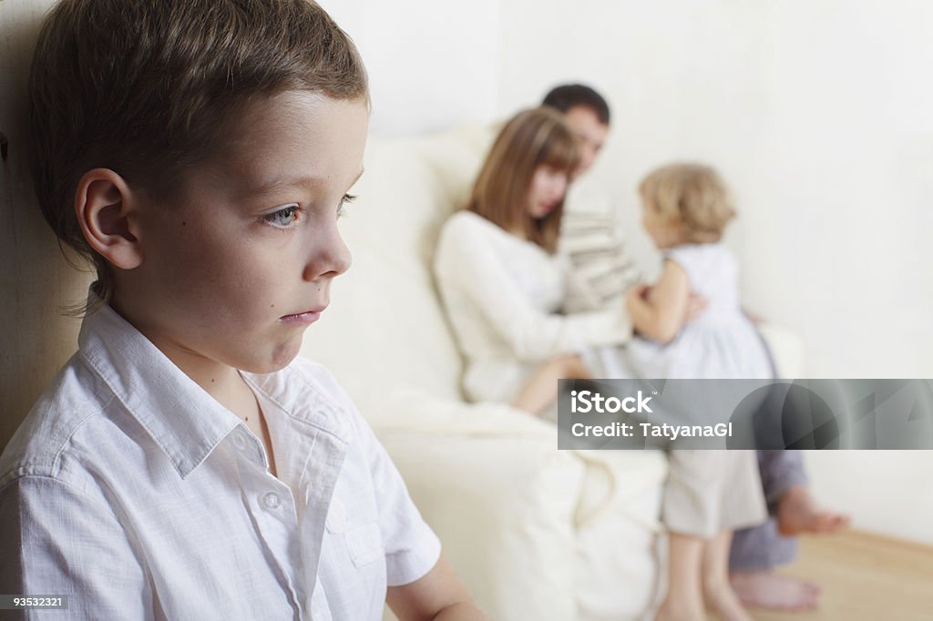 Young boy jealous of his younger sister Boy is jealous parents of younger sister Envy Stock Photo