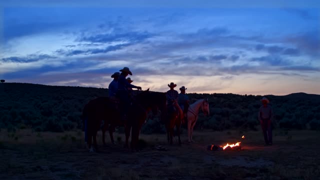 Group of cowboys on a campfire in Utah, USA