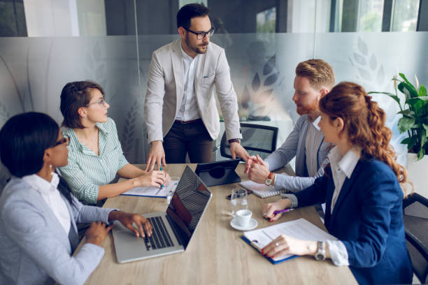 istock Group of business people brainstorming about innovative ideas 935338220