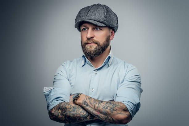 istock Bearded male in a shirt and tweed cap. 935338404