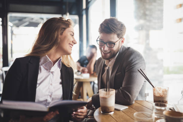 istock Business people talking and laughing together 935345654