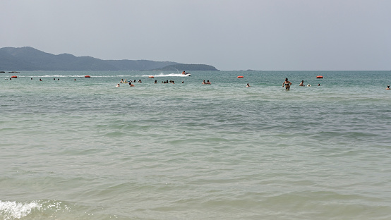 Pattaya,Thailand- February 20,2018: Sai Kaew Beach -Military Beach.People sunbathe and swim