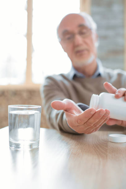 istock Pleasant senior man sticking to medication routine 935355610