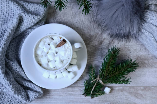 istock Coffee with marshmallows at the Christmas tree. Festive warming 935357128