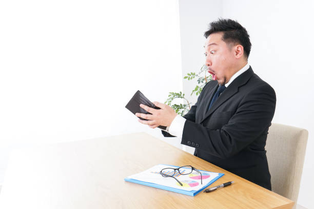 istock Businessman being suprised at wallet 935363598