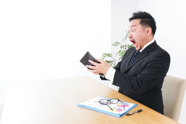 istock Businessman being suprised at wallet 935363604