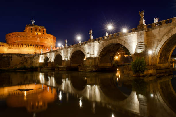 istock Castel Sant'Angelo and river Tiber view at night, Rome, Italy 935366834