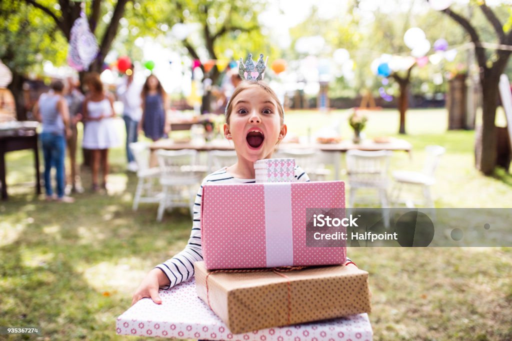 Family celebration or a garden party outside in the backyard. Family celebration outside in the backyard. Big garden party. Birthday party. Child Stock Photo