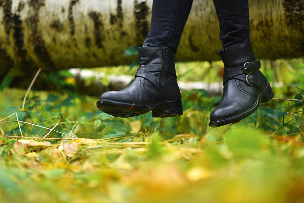 istock Boots for a walk in the Park. Autumn forest is beautiful. Yellow 935367350
