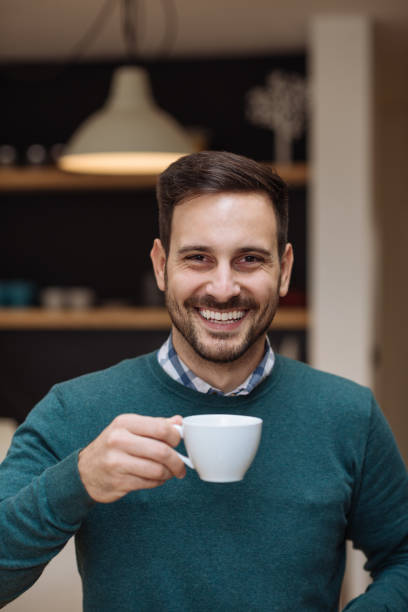 istock Sipping coffee at home 935369132