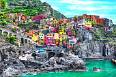 Beautiful view of Manarola town. Is one of five famous colorful villages of Cinque Terre National Park in Italy, suspended between sea and land on sheer cliffs. Liguria region of Italy.