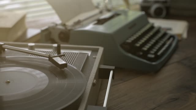 Vintage desk with record player and typewriter