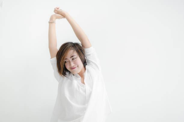istock Beautiful Asian woman feeling lazy with white room. 935380232
