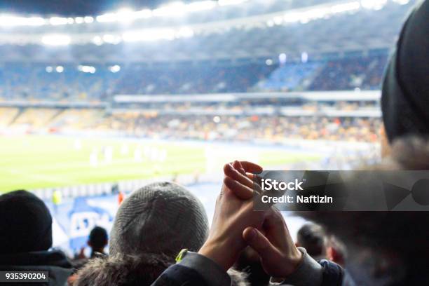 Fans At The Stadium Support The Cotton Sports Club Stock Photo - Download Image Now - Soccer, Stadium, Spectator