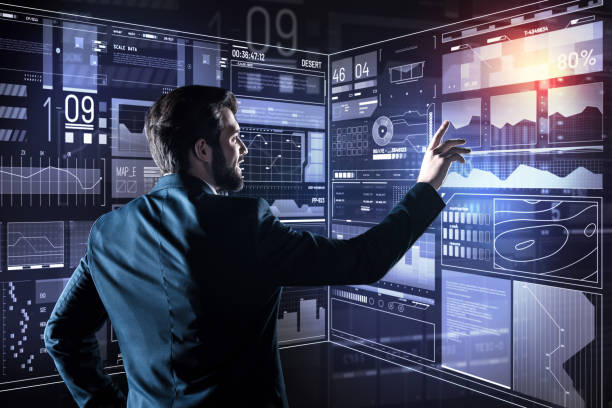 istock Bearded man smiling while looking at the results of his work 935390418