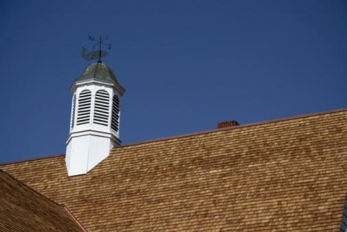 The roof of a private house made of natural ceramic tiles.