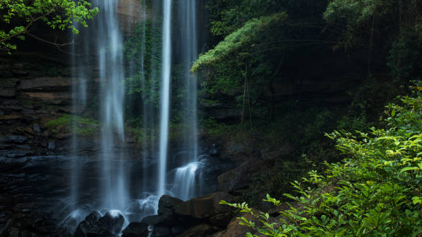 istock Beautiful waterfall at tropical rain forest 935395088