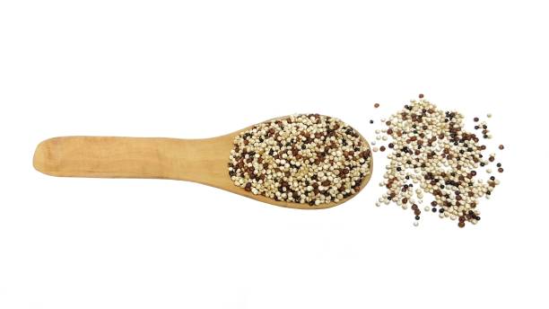 istock Three colour quinoa on wooden spoon 935395098