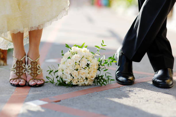 istock Groom and  bride with bouquet 935396344