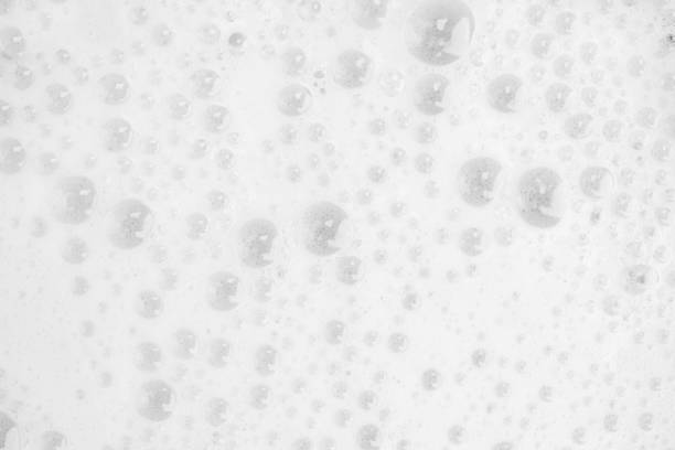 istock Foam bubble from soap or shampoo washing on top view 935401416