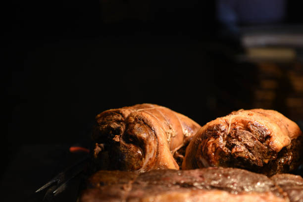 istock delicious whole roast lamb joints with dark background and space 935401514