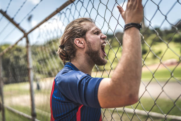 istock Fan watching a soccer game 935402300