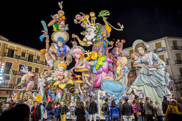 The faults. Falla Convento Jerusalen, 2018. Valencia, Spain. Valencia, Spain – March, 18, 2018: Las Fallas, papermache models are displayed during traditional celebration in praise of St Joseph, in Valencia, Spain. The term Falles refers to both the celebration and the monuments burnt at the end of the festivity. Celebration is annual, and it was declared a UNESCO World Heritage in 2017. This falla is in Convento Jerusalen street, and its theme is to demand to the politics to take care the nature. People visit the falla. convento stock pictures, royalty-free photos & images
