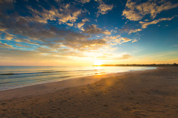 istock sunset over ocean on tropical island 935403098